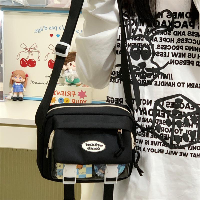 

Контрастный цвет Милая маленькая свежая сумка-багет Студентки Джокер Легкая прозрачная сумка через плечо Сумка на плечо. .