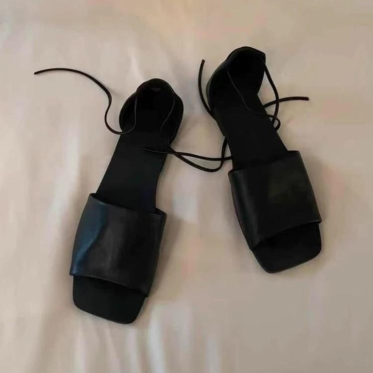 Cowhide version~ niche open-toe one-word sandals women's flat-bottomed strap bag and half slippers for outer wear