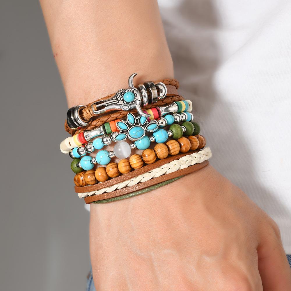 Cross-border new products European and American beaded alloy multi-layer retro bull head cat claw handwoven set bracelet