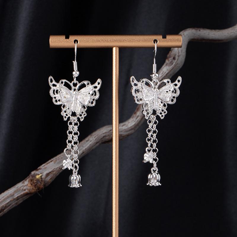 Bohemian Ethnic Miao Silver Tassel Earrings with Butterfly, Peacock, and Flower Design for Women – Long Dangle Jewelry for Travel Photos.
