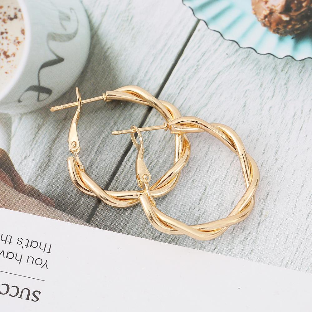 Trendy Geometric Twist Hoop Earrings: Stylish Metal Accessories for Women