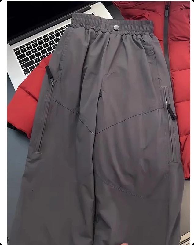 

Дівчачі вітрозахисні штани з широкими штанинами на флісовій підкладці - Осінь/Зима 2025 140 темно-сірий