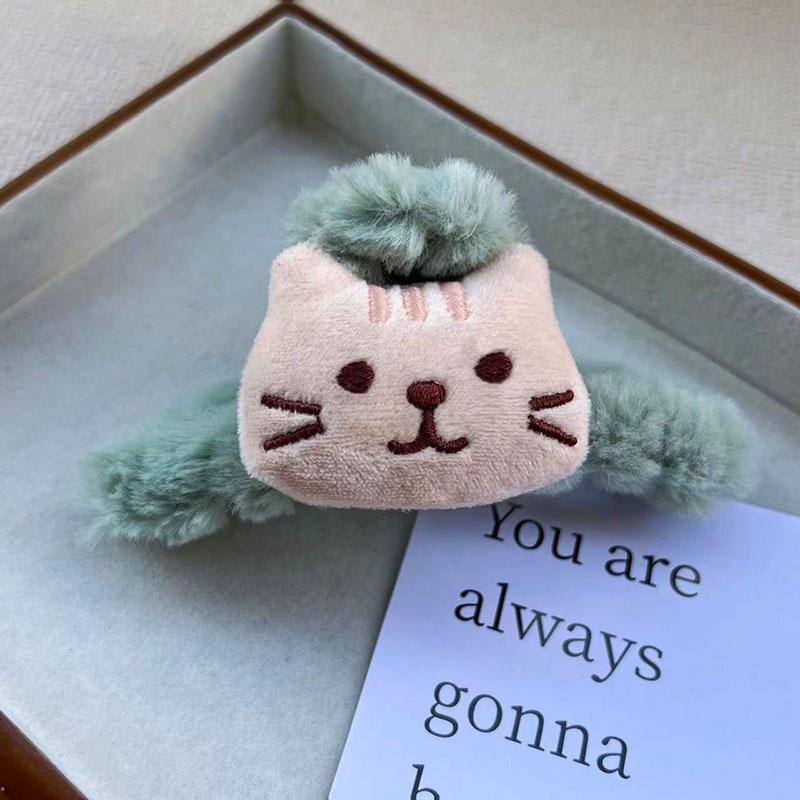 

2024 Cute Christmas Reindeer & Snowman Plush Hair Claw Clips for Women