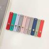 Silikonowy stojak push-pull na telefon: Jednolity kolor, Przenośny, Samoprzylepny, Regulowany.