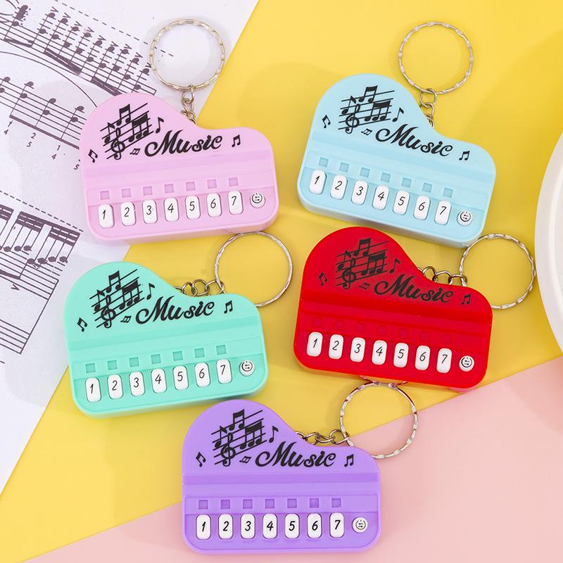 Mini Handheld Luminous Electronic Piano Keychain for Kids