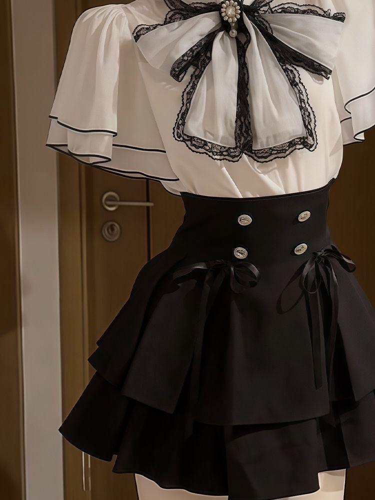Completo due pezzi: Top in chiffon giapponese con maniche a tromba e gonna estiva attillata