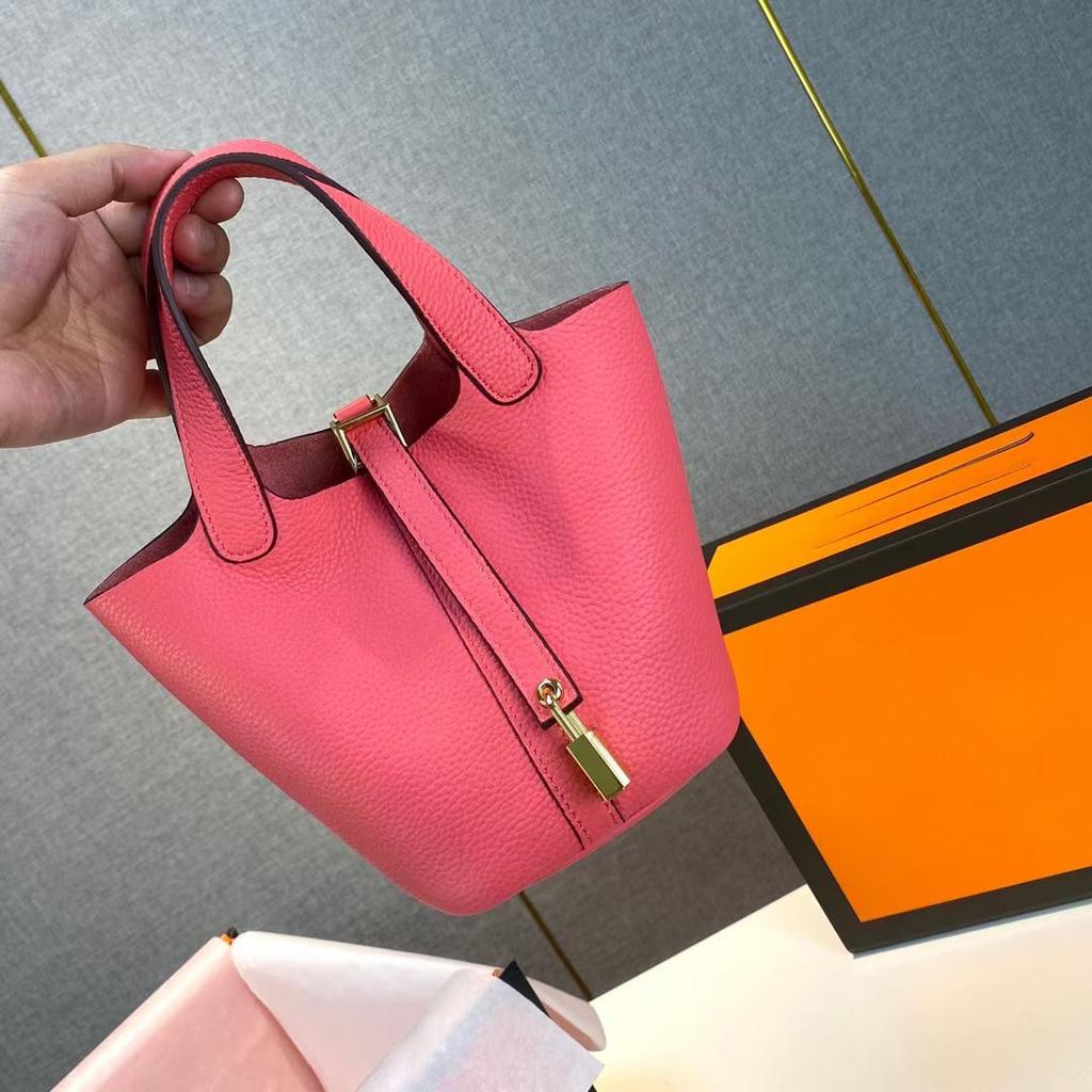 Hochwertige halbhandgefertigte Gemüsekorbtasche togo erste Schicht Rindsleder Pendlertasche echtes Leder tragbare Beuteltasche Damen 18cm