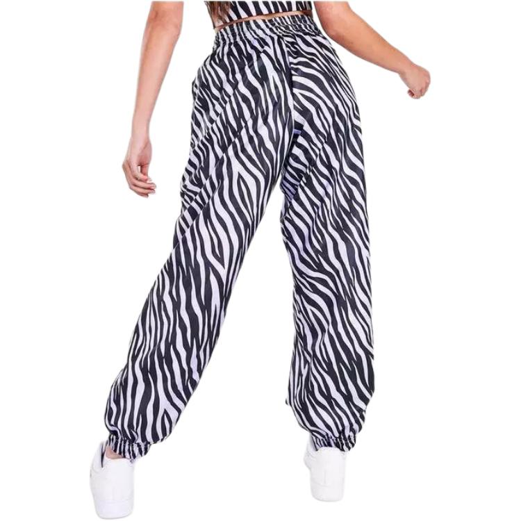 Nike Pantalones deportivos de punto con cordón estampado de cebra para mujer, parte inferior, negro DC5292-596