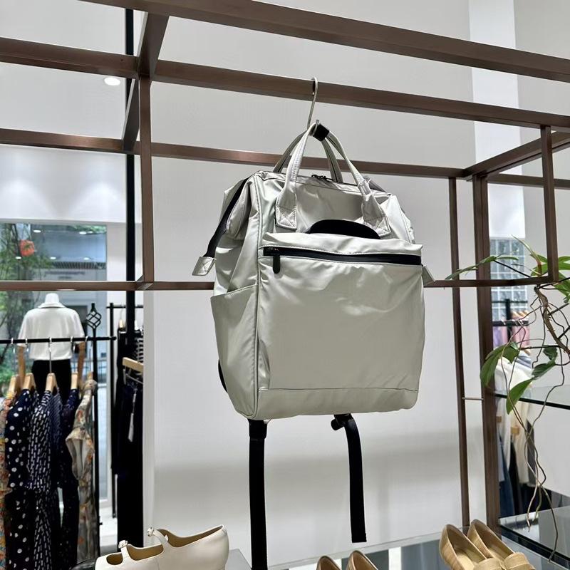Značka módního návrháře Dámský a pánský batoh Trendy styl Taška na notebook 15,6 palce PU kůže Businessový ruksak Dámská školní taška