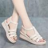 Hollow breathable sandals women's summer new slope heel platform casual versatile medium shoes women's shoes