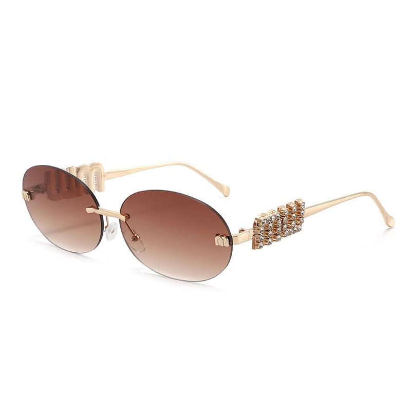 Premium sense frameless rhinestone sunglasses women's retro oval UV protection sunglasses ins wind sunscreen explosive glasses