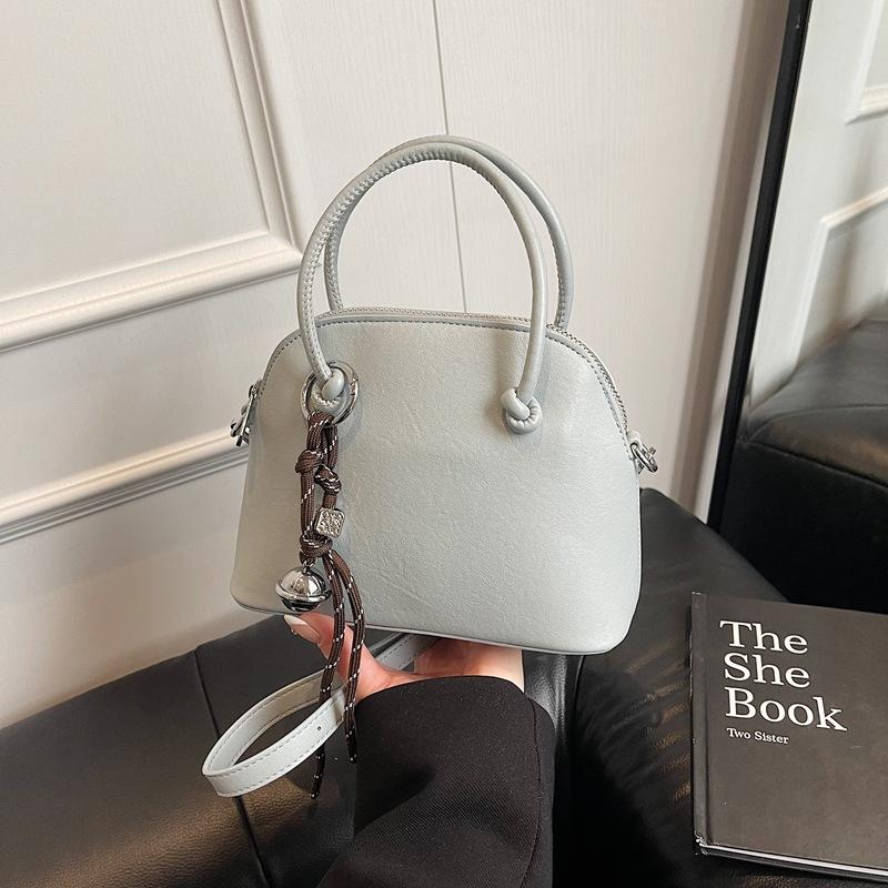 Niche light luxury portable shell bag women's new high-end retro fashion shoulder messenger bag