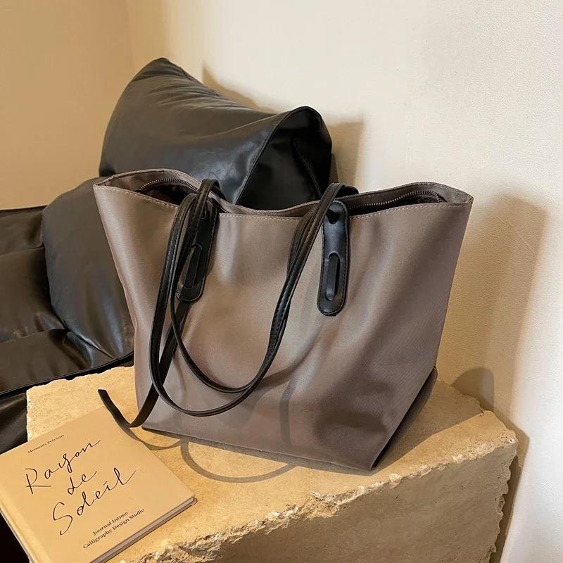 Oxford Textil Enfärgad Säljer Damers Tygväska Dragkedja Mångsidig Mode Axelväska Mjuk Enkel Populär Handväska