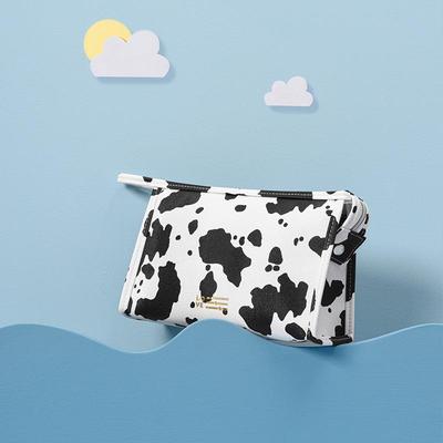Cow Print Waterproof Cosmetic Travel Bag - Portable Skincare Organizer