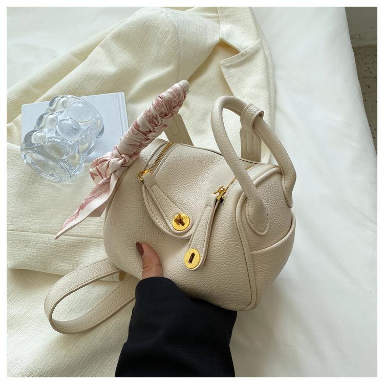 

Fashion lock simple hand carry women s bag niche lychee pattern sweet shoulder bag temperament commuter large capacity messenger bag