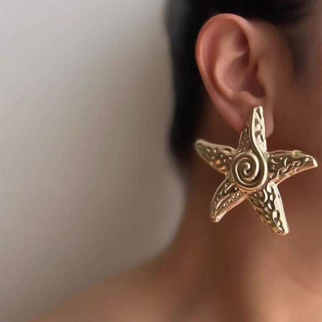 Seaside earrings summer ocean vacation wind alloy starfish earrings women's European and American niche exaggerated earrings