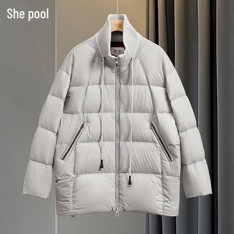 

Женская трикотажная куртка-пэчворк с 90% пуха XL