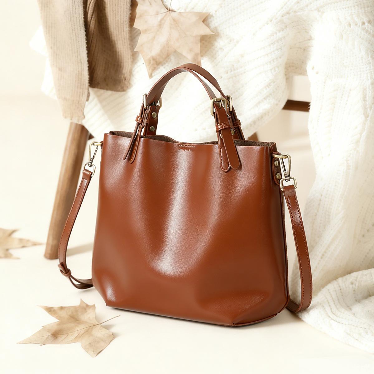 

Leather Commuting Tote Bag with High-end Feel, Single Shoulder Bucket Bag, Light Luxury, Large Capacity, Women s Top Layer Cowhide Bag, Bucket Bag коричневий