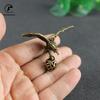 Antique Bronze Eagle Catch Ball Statue Solid Copper Eagle Figurines Ornaments Bicycle Handbag Tel Keychains Decoration Accessor
