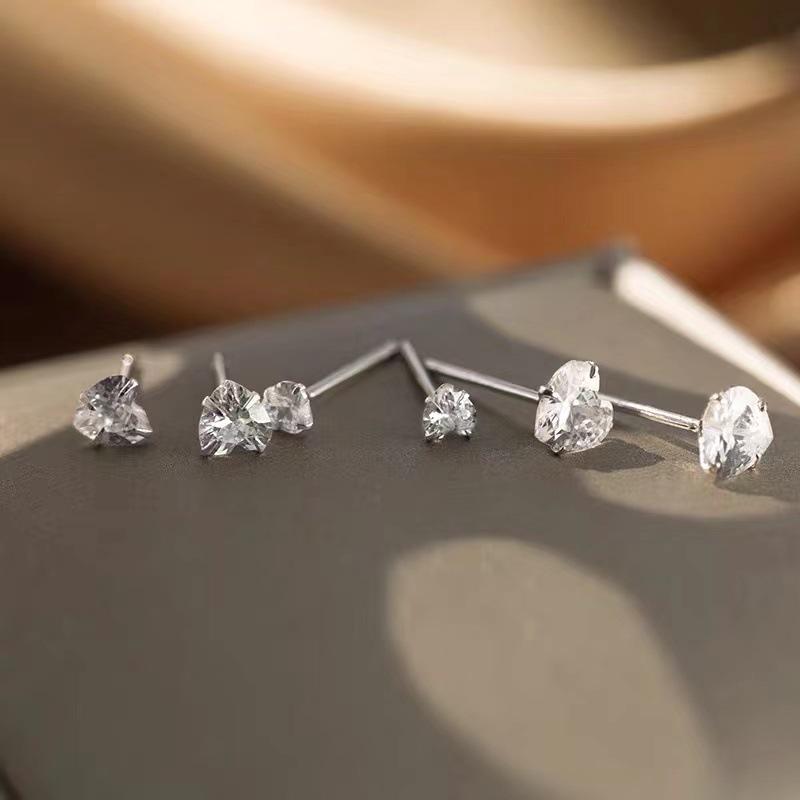 "Sterling Silver Heart-Shaped Zircon Earrings for Women - Simple, Elegant, and Luxurious."