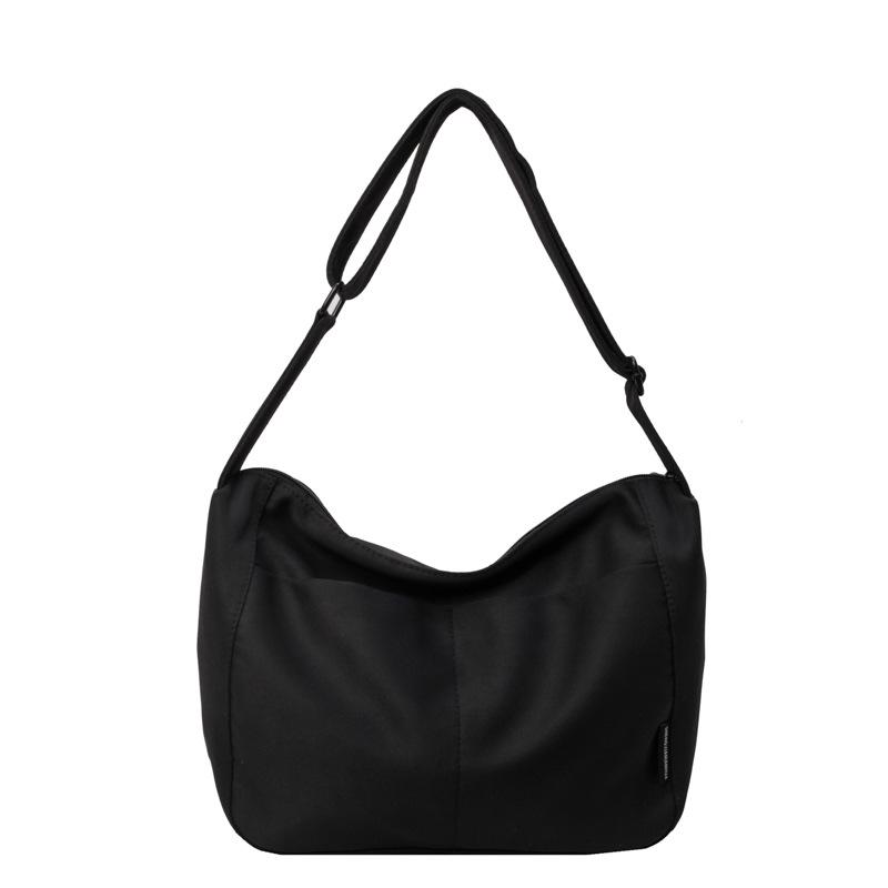

New stylish simple solid color casual canvas messenger bag shoulder women s bag retro commuter dumpling bag чёрный
