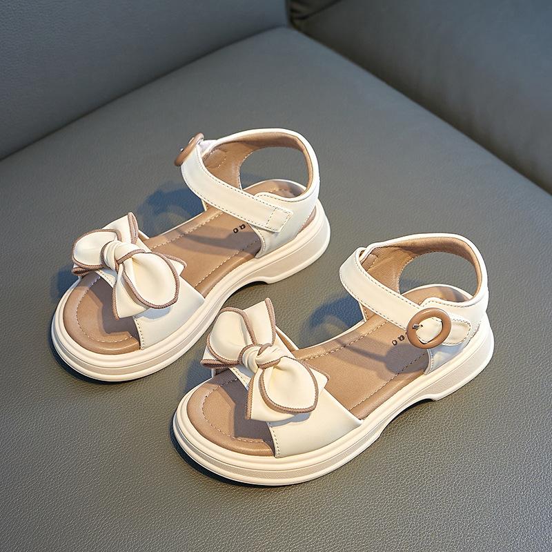 

Сандалии для девочек 2025 новые летние туфли принцессы для маленькой девочки детские мягкая подошва нескользящие модные летние универсальные корейская версия 26-31 yards whole box shot 48 pairs бежевый