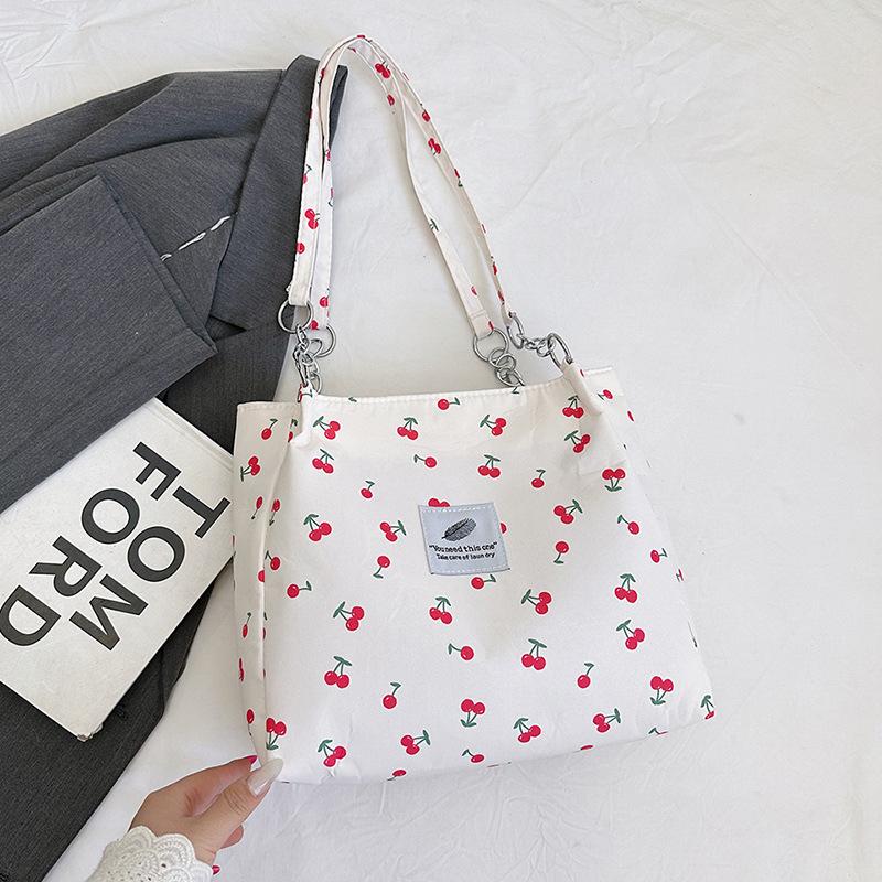 

Large capacity niche design shoulder bag, new tote bag, portable women s bag, student shopping bag. белый