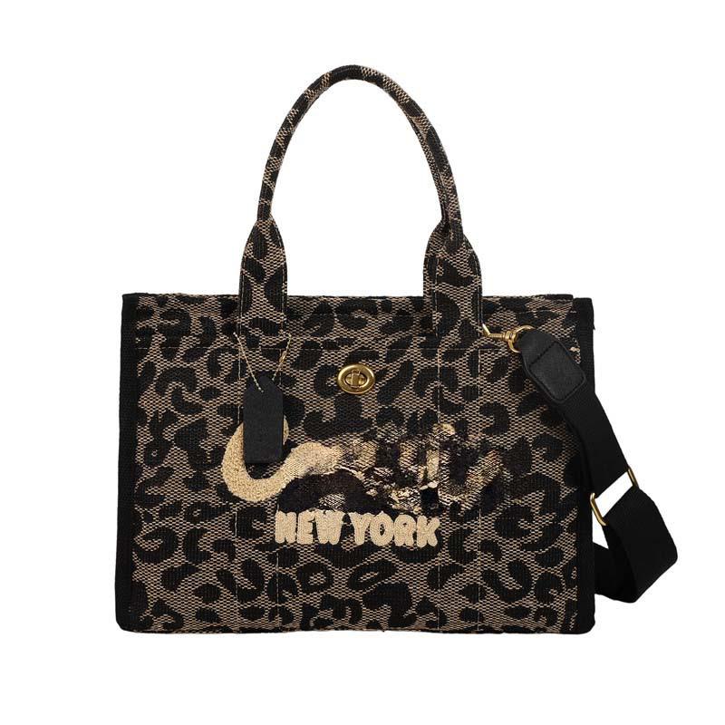 2025 Hot-Selling Large Capacity Canvas Tote: Stylish Commuter & Crossbody Bag.