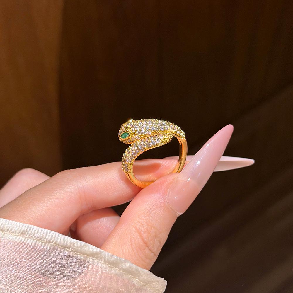 Korean Elegant Snake Ring: Luxurious Full Diamond with Green Eyes and Zircon Inlay for Women.