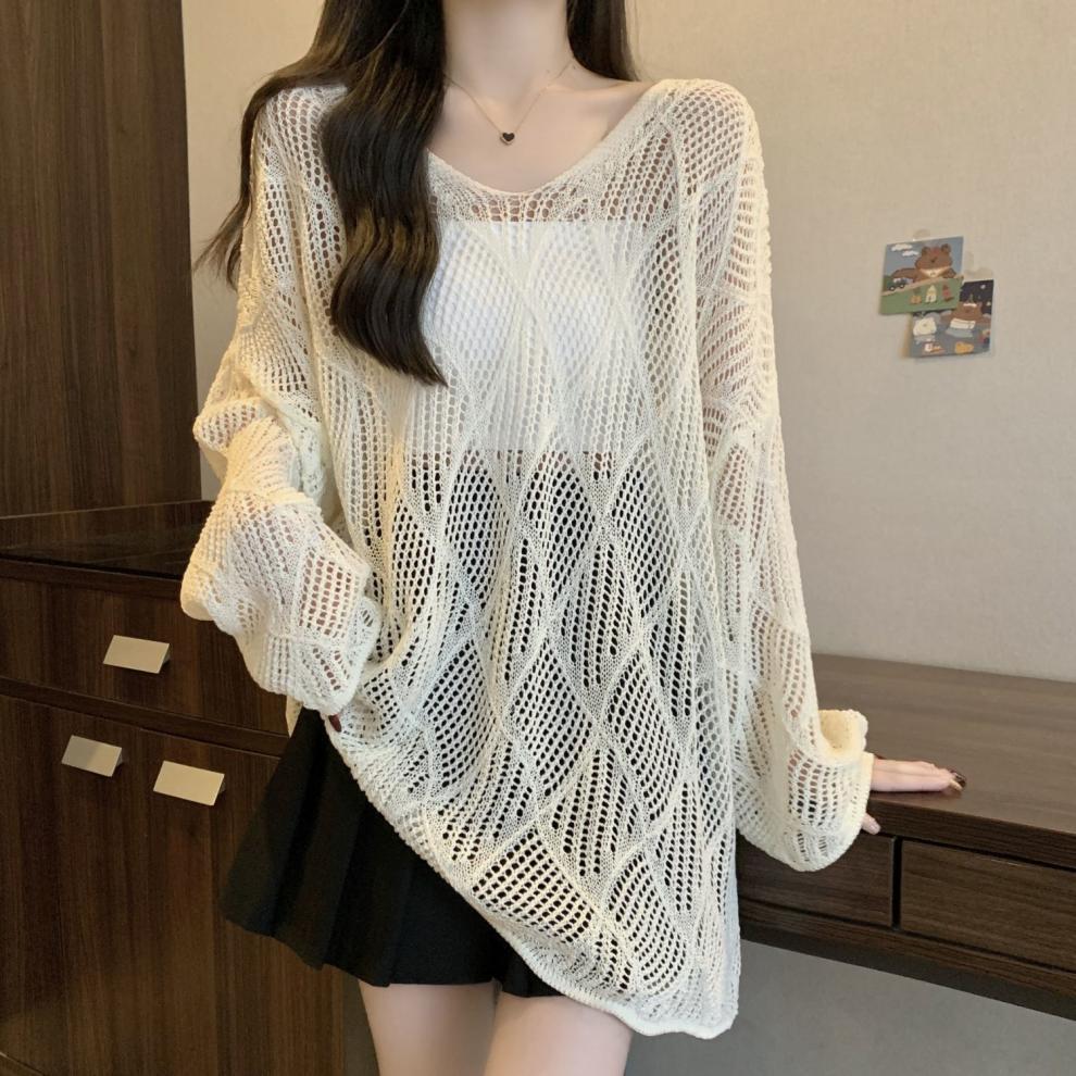 Rhombus lazy V-neck hollow long-sleeved knitted sweater women's spring and summer hem irregular sunscreen blouse knitted top