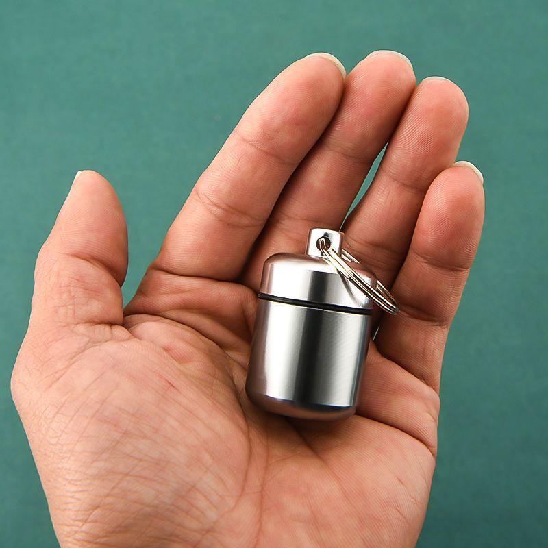 1 Stück Metall Mini Wasserdicht Legierung Reise Pillendose Pillenflasche Versteck Medikamentenhalter Behälter Schlüsselanhänger Medizinbox Gesundheitswesen