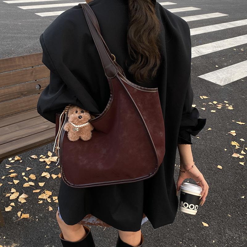 Autumn new soft waxy women's bags versatile light luxury fashion matte personalized portable underarm bags trendy shoulder bags