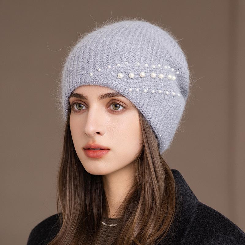 Herbst und Winter Neue Mode Warmer Ohrenschutz Strickmütze Damen Kaninchenfell Wollmütze