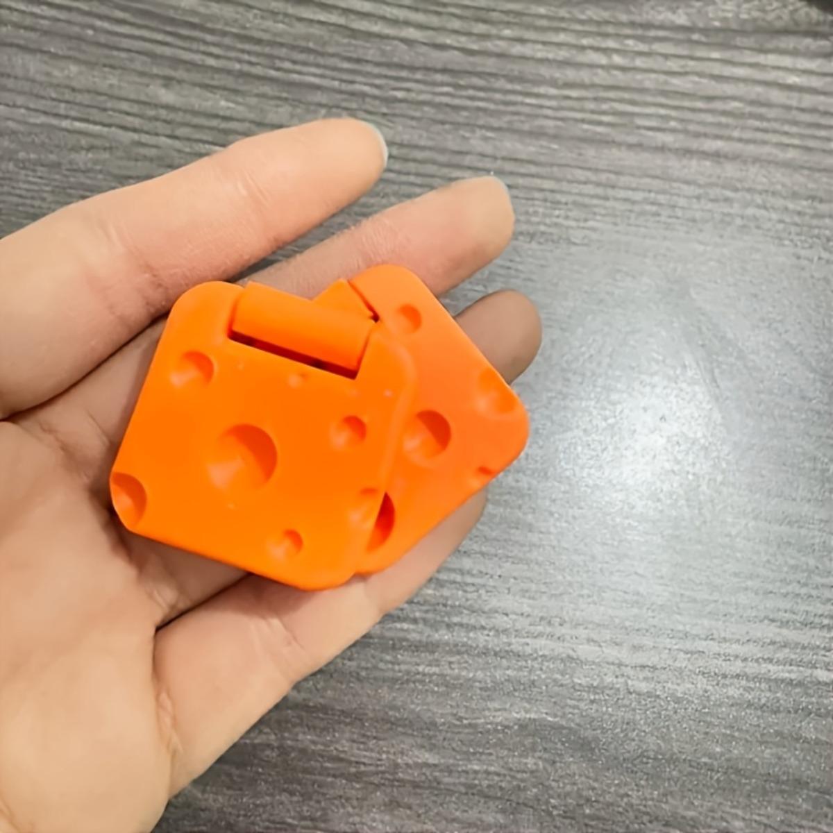 

Small Finger-Tip Cheese Slider Toy, Creative Spinning Top with Flip & Spin Action помаранчевий
