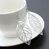 SUMENG 2024 New Fashion Jewelry Hollow Metal Leaf Dangling Long Statement Drop Earrings For Women Gifts