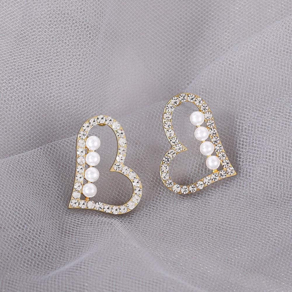 Temperament simple pearl love stud earrings women's light luxury niche design sense high sense Korean versatile earrings ear jewelry