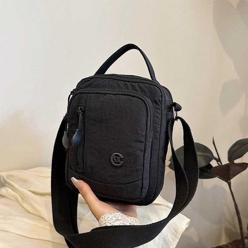 

Multi-layer lightweight sports summer small square bag women s multi-pocket shoulder bag large capacity messenger bag men s mobile phone bag чорний