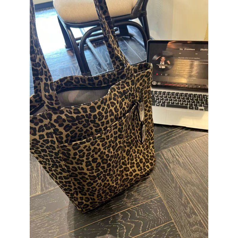 

Корейская ретро холщовая сумка с леопардовым принтом женская 2025 новая осенне-зимняя большая вместительная на плечо сумка-тоут многокарманная сумка для поездок на работу