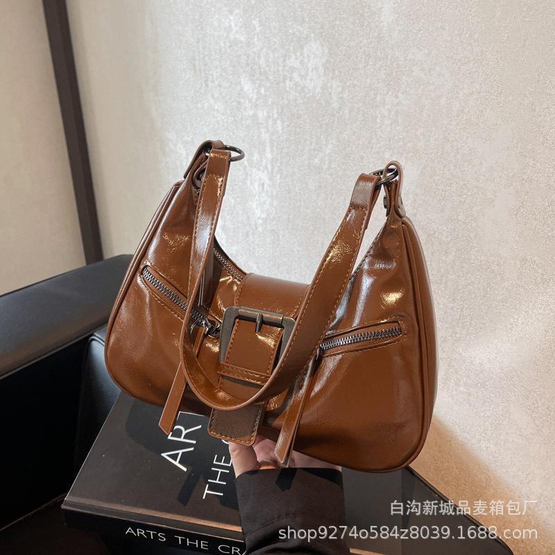 

Underarm bag women s autumn and winter Maillard retro women s bag 2025 fashion versatile single shoulder crossbody portable crescent bag коричневий