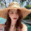 Elegant Raffia Sun Hat With Wide Brimmed And Breathable Openwork Design For Beach Vacation And Outdoor Activities