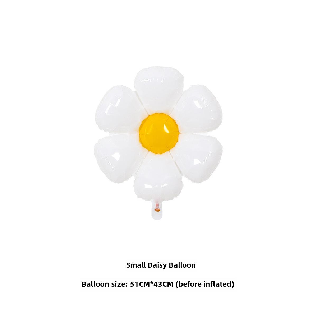 

Маленькие шары с ромашками и подсолнухами в виде улыбок — реквизит для фотосессии на день рождения