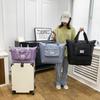This large-capacity travel bag for women is a lightweight handbag for short trips, a maternity bag, and a sports and fitness bag