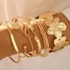 Elegante Vintage Hohllinien-Streifenblumen-Drehmetall-Armreif-Armband-Sets für Damen Tägliches Tragen Party Hochzeit Urlaub Schmuck