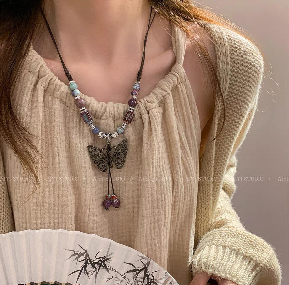 Bohemian Ethnic Style Long Bow Metal Necklace with Vintage Distressed Pendant (2025)