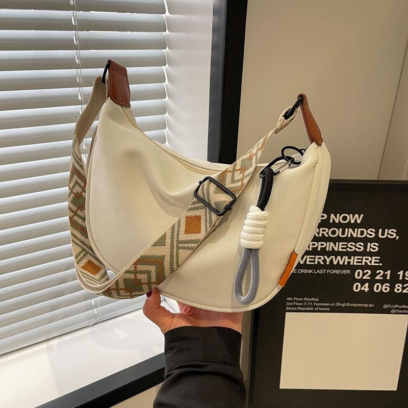 Crossbody bag Women's cloth bag Summer canvas Casual dumpling bag Niche commuter small bag One shoulder versatile new model