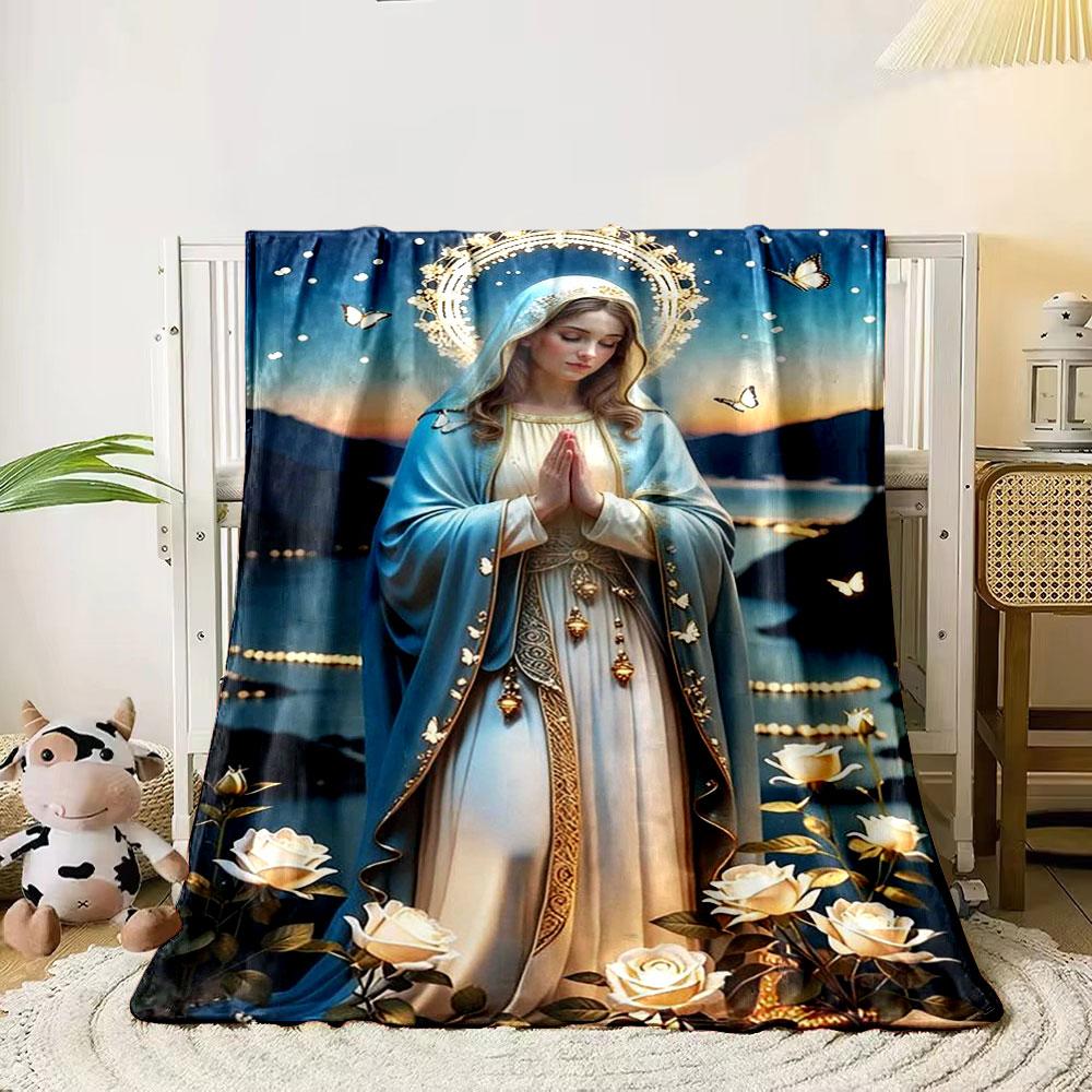 

A serene figure with a halo, surrounded by butterflies and white roses. for all seasons blanket lunch break throw gift 80cm x 120cm