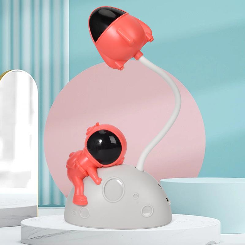 Astronaut LED Night Light: Moon Man Bedside Lamp for Student Dorms, Reading, and Desk Atmosphere.