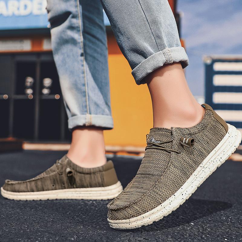 Large size foreign trade men's trendy fashion loafers fly-woven breathable one-pedal soft-soled casual shoes men's large size men's shoes