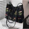 Bolso de mano bordado de gran capacidad, bolso de tela de moda de verano para mujer, bolso de hombro con bordado de nicho, bolsos tipo cubo con textura, bolsos de lona