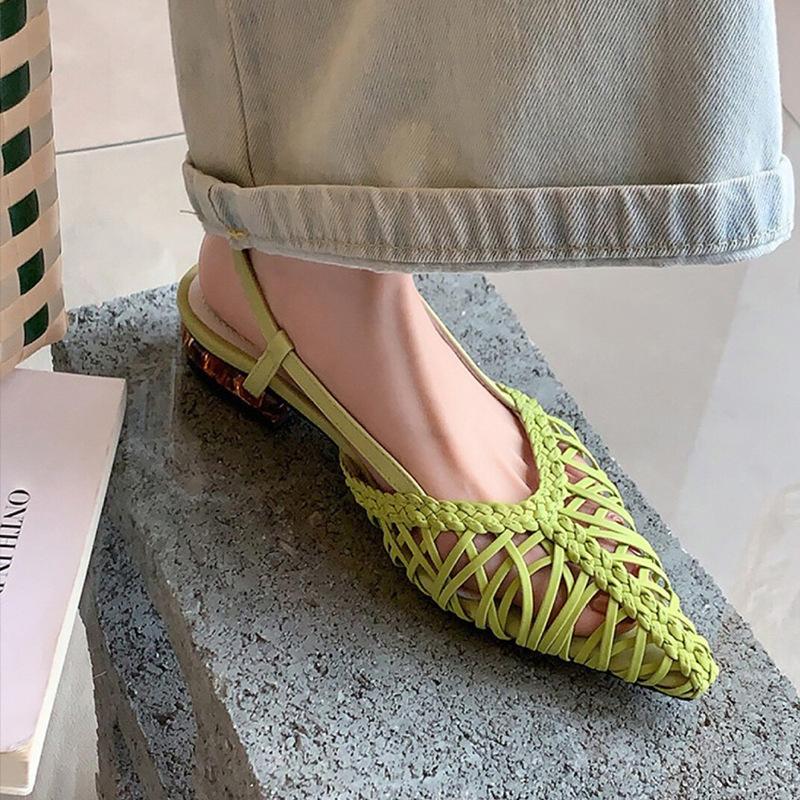 Sheepskin Korean version of niche leather woven breathable sandals women's summer flat bottom pointed hollow Muller outer wear cool slippers